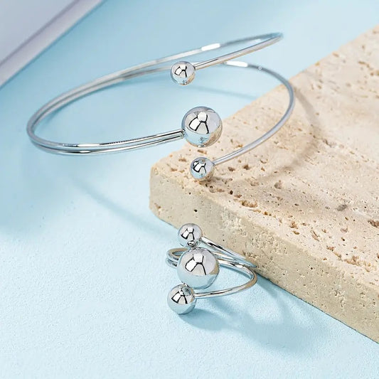 Justerbar metallring og armbåndssett